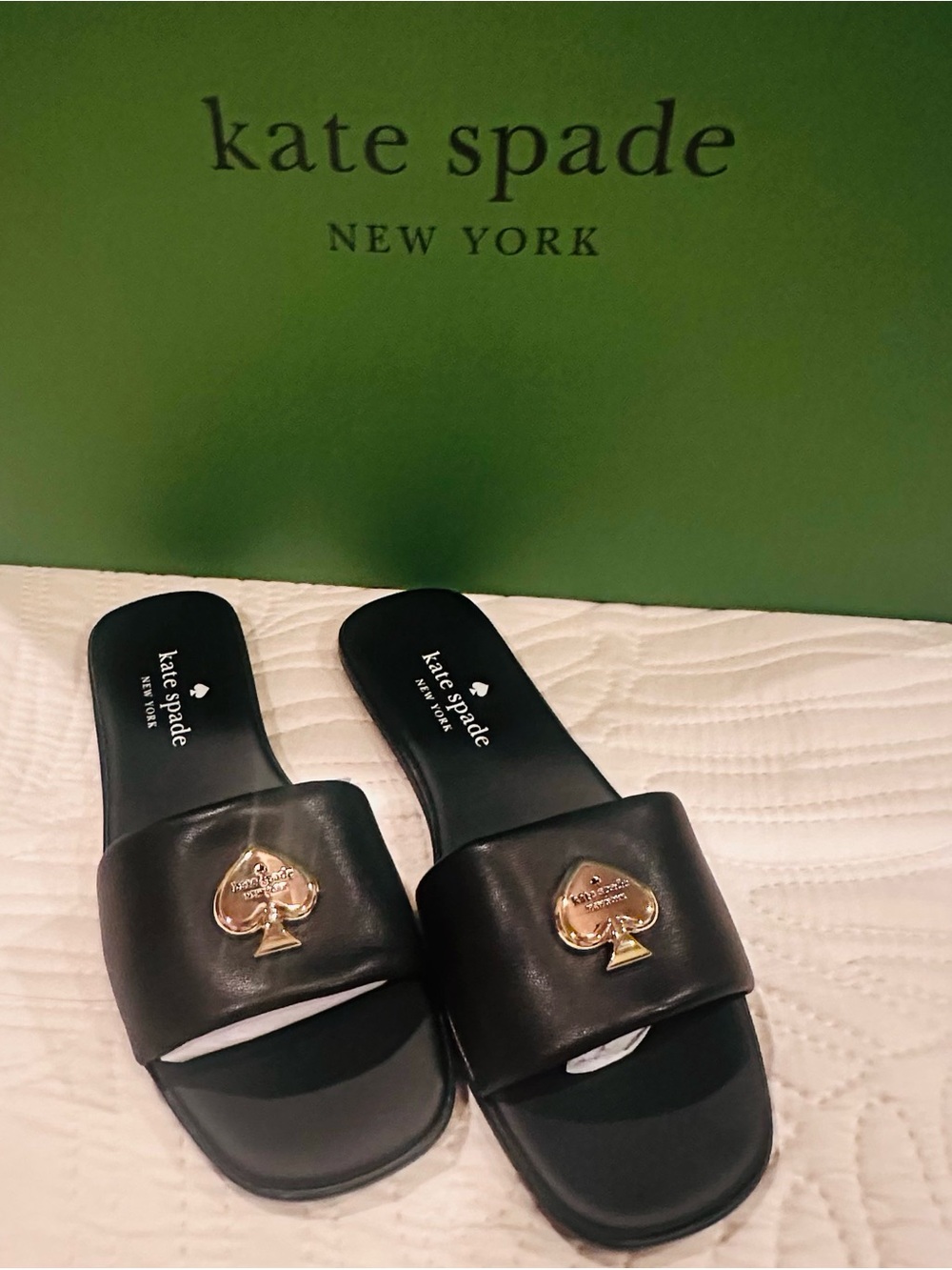 kate spade Black Leather Slide Mules with Gold Spade Medallion